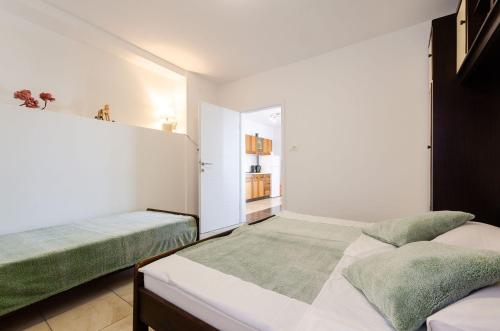 Mediterranes Apartment nur 300 Meter zum Strand mit Privatparkplatz, Grill, Klima
