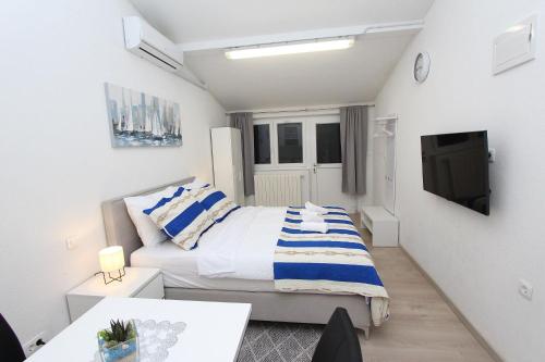 Idyllisches Studio-Apartment nur 600 Meter zum Strand mit Parkplatz, WiFi, Klima