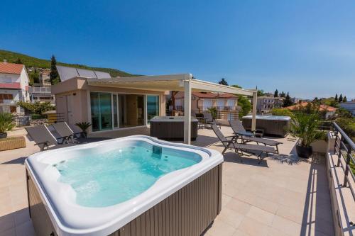 Hundefreundliches Apartment nur 100 Meter zum Strand mit Sauna, Meerblick, Whirlpool