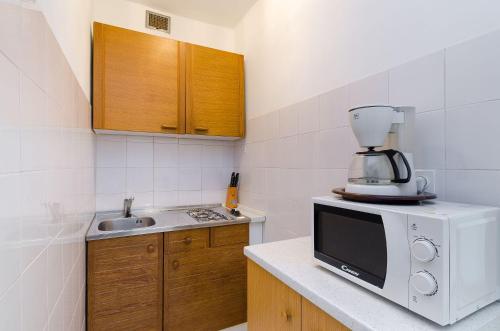 Romantisches Apartment mit mediterraner Terrasse, Privatparkplatz und Grillbereich