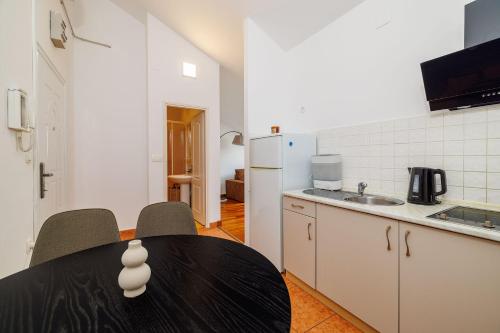 Dachgeschoss Apartment mit Meerblick, Privatparkplatz und Waschmaschine