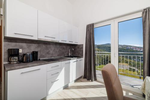 Atemberaubendes Apartment mit tollem Meerblick, Waschmaschine, Grillbereich