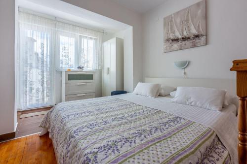 Zentrales Apartment nur 250 Meter zum Strand mit Privatparkplatz