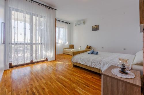 Komfortables Apartment mit Meerblick, Garten, Grillberich und Parkplatz