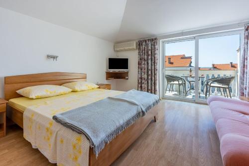 Besonderes Studio-Apartment nur 800 Meter zum Strand mit Meerblick, Parkplatz, Grill