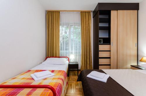 Modernes Apartment nur 500 Meter zum Strand mit WiFi und Privatparkplatz