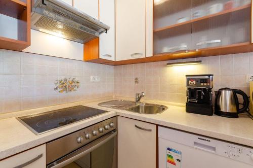 Cozy Apartment nur 500 Meter zum Strand mit Privatparkplatz, Klima, WiFi