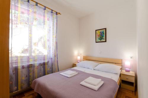 Liebevolles Apartment nur 500 Meter zum Strand mit Privatparkplatz, WiFi, Klima