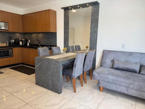 Kuchyň nebo kuchyňský kout v ubytování Casa 700m do mar Penha SC