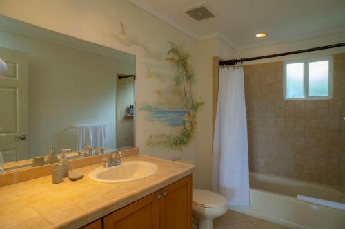 Et badeværelse på Del Mar 3i 3 bdr Ocean View in Los Suenos