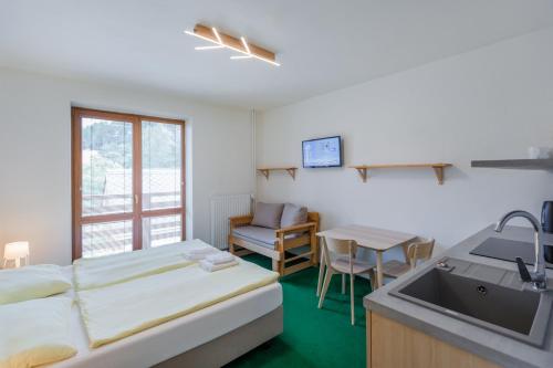 Postel nebo postele na pokoji v ubytování Hotel Rusava 2 depandance