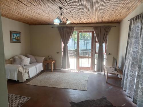 Postel nebo postele na pokoji v ubytování Starfish Cottage