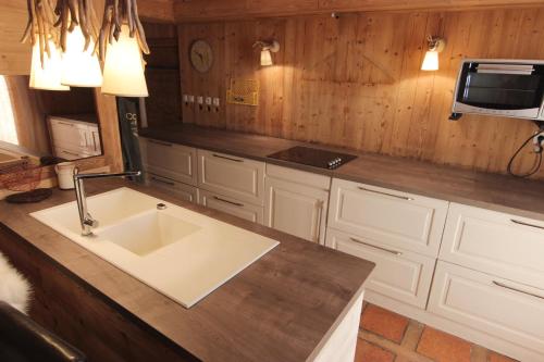 Kuchyň nebo kuchyňský kout v ubytování Peclet Appartements VTI