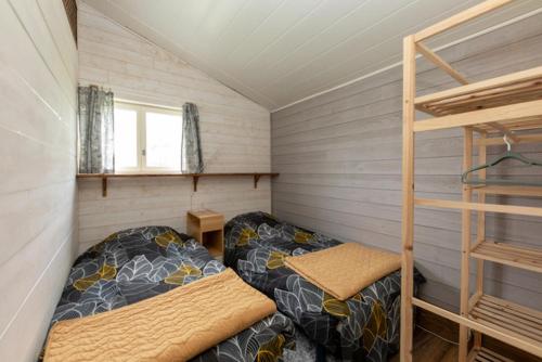 En eller flere senge i et værelse på Little ranch