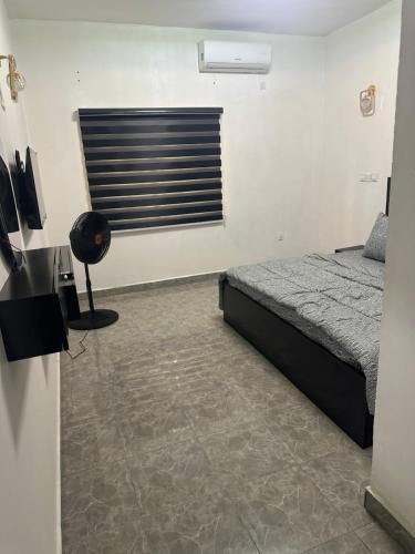 Postel nebo postele na pokoji v ubytování Sam Apartment