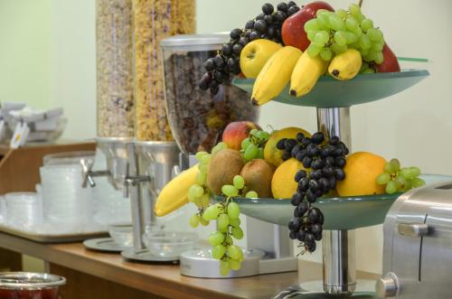 a display of fruit on top of a table at Kymata Hotel in Naxos Chora