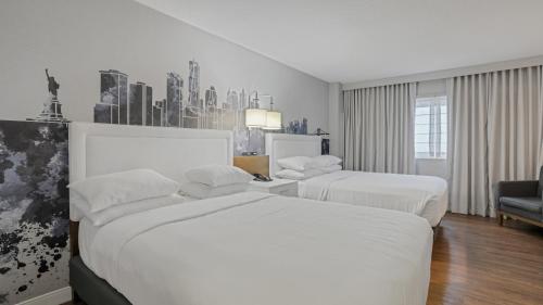 Postel nebo postele na pokoji v ubytování 714 Double Queen Near MetLife & American Dream