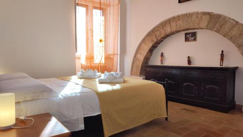 En eller flere senge i et værelse på All'Ombra di Santa Chiara, 140mq, 3 camere, Idromassaggio - Novità da MyAssisiSuite - Mówimy po polsku