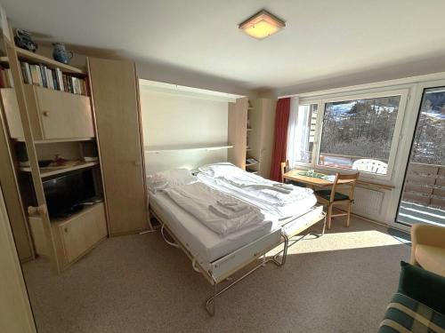 En eller flere senge i et værelse på Apollo 47