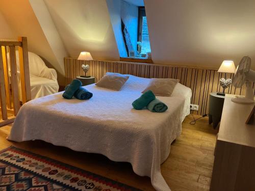 Llit o llits en una habitació de L Elegant Medieval