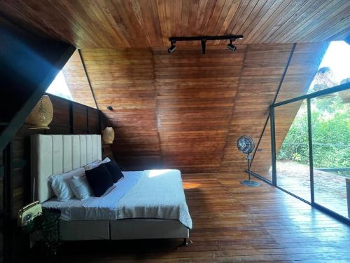 Een bed of bedden in een kamer bij Idílico Glamping