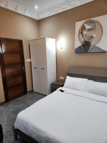 Giường trong phòng chung tại Appartements meublés mpita