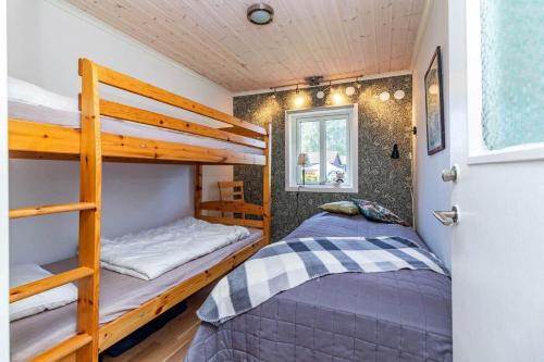 Postel nebo postele na pokoji v ubytování BLE835-Sturkoe-Sturkoevaegen-44