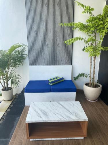 En eller flere senge i et værelse på Villa Daisy Private Pool