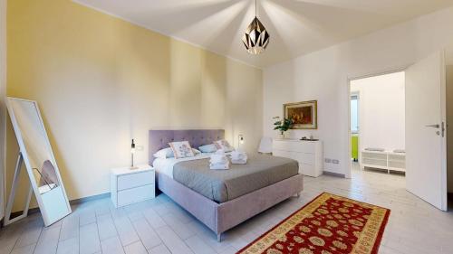 Giường trong phòng chung tại La Verde - San Donato M3