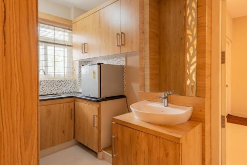 Køkken eller tekøkken på Daan Ambalath Maple Leaves