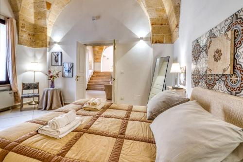 a bedroom with two beds in a room at Volta Apartment in Mesagne