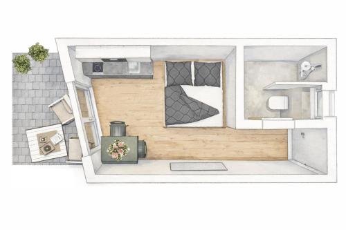 a floor plan of a small apartment with a room at JONI Apartments Berwang in Berwang