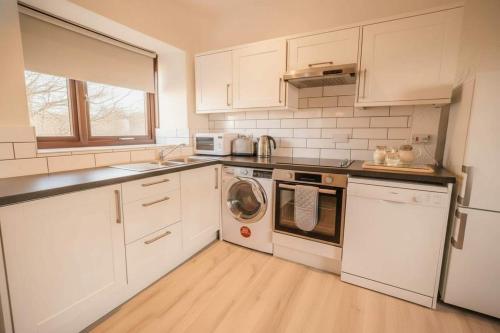 Køkken eller tekøkken på Spacious 2 Bedroom Coastal Cottage nr Bude