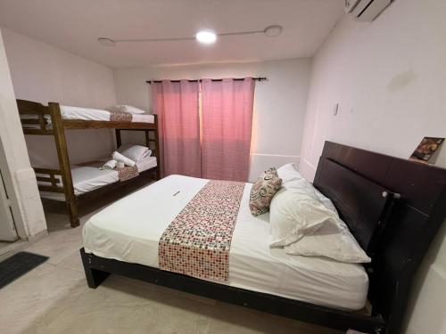 Letto o letti in una camera di SGH Mathilu Rodadero