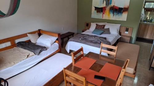 Giường trong phòng chung tại A Paz e Energia do Rodeadouro