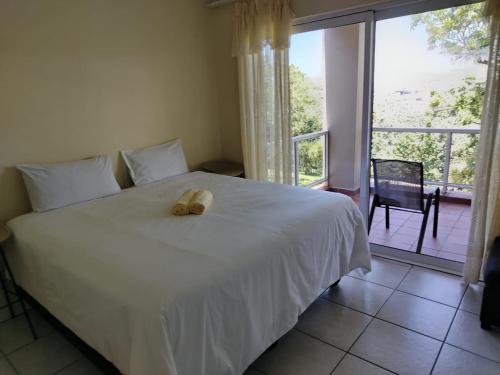 Giường trong phòng chung tại Shelly Beach Guest House