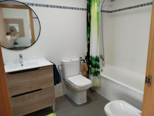 Et badeværelse på Super appartement à 200m de la plage à « Portisel »