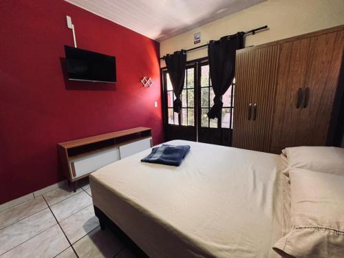 Postel nebo postele na pokoji v ubytování POUSADA DO MILAGRE SAO FRANCISCO DO SUL sc