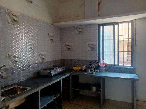 Køkken eller tekøkken på Solo 1BHK stay No sharing full privacy