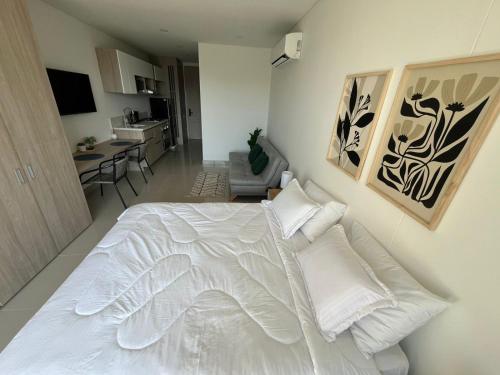 En eller flere senge i et værelse på Reserva del Mar II 821