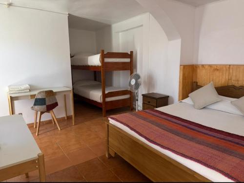 Postel nebo postele na pokoji v ubytování Hotel Turi Atacama