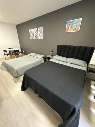 En eller flere senge i et værelse på MOVISTAR ARENA PREMIUM Thames 56 4 piso 406 Cochera y Seguridad