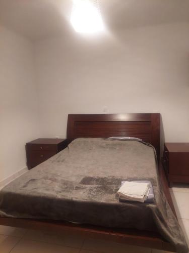 En eller flere senge i et værelse på Apartment for rent