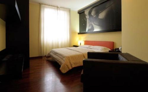 Nine Hotelにあるベッド