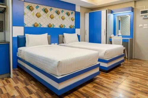 Afbeelding uit fotogalerij van The Ring Residence in Sathani Hat Yai