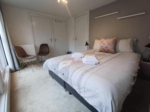 Giường trong phòng chung tại Sientjes Den Bosch