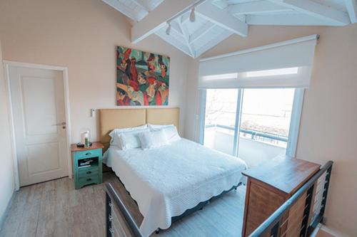 Postel nebo postele na pokoji v ubytování La Santina Posada & Experiencias de Campo