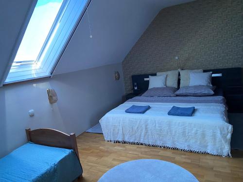 Postel nebo postele na pokoji v ubytování Süti Nyaraló