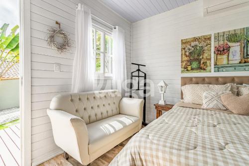 En eller flere senge i et værelse på Cabana Coração: Romantismo, Banheira e Natureza