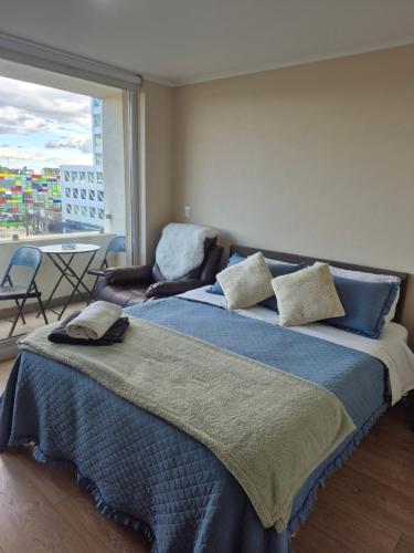 Giường trong phòng chung tại Departamento Central Osorno 2